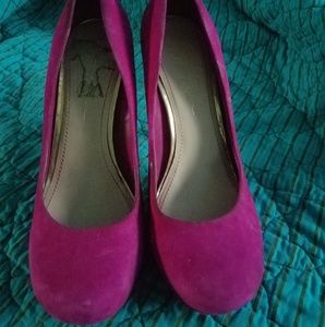 Pink suede pumps